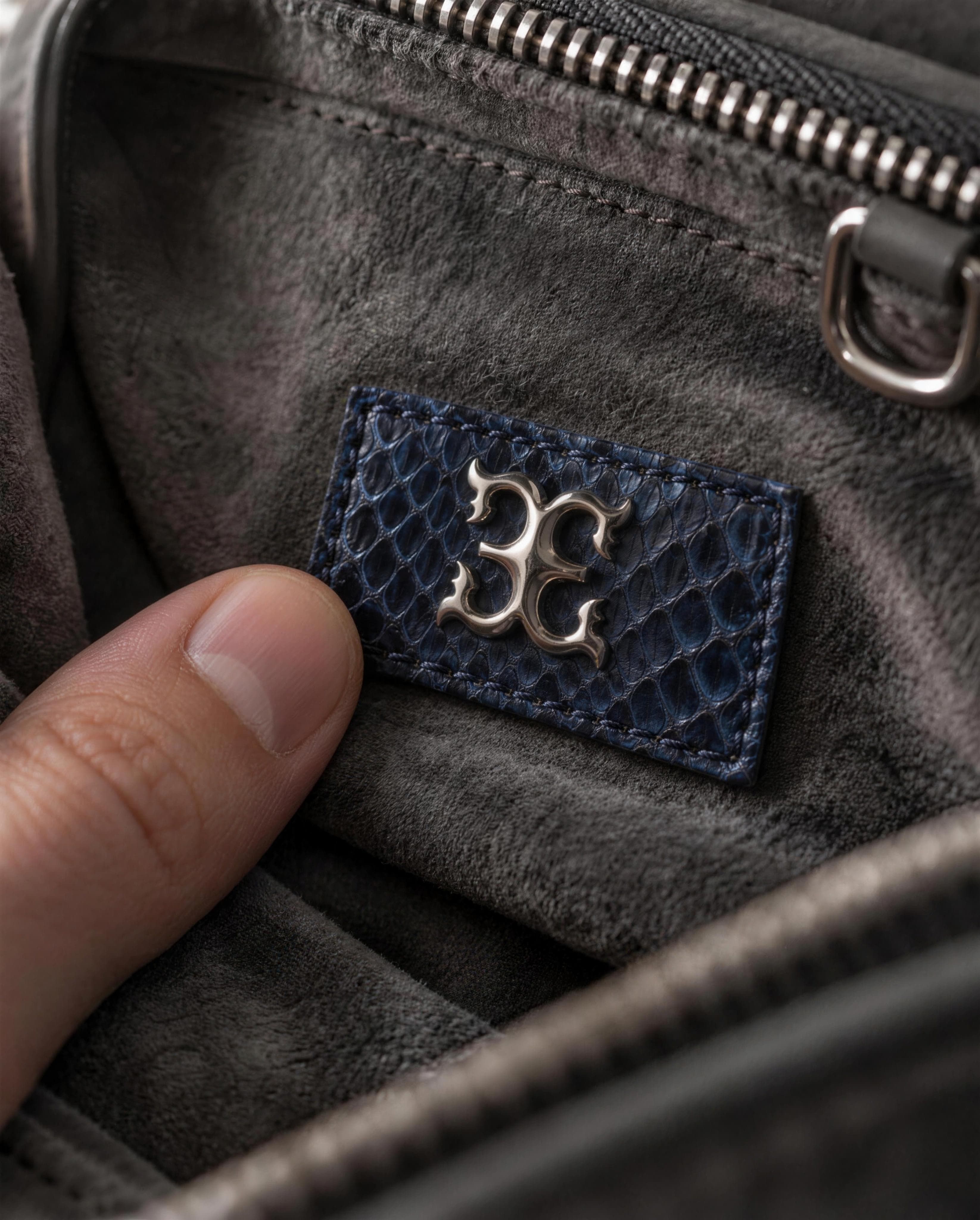 A thumb resting on the seal inside the bag